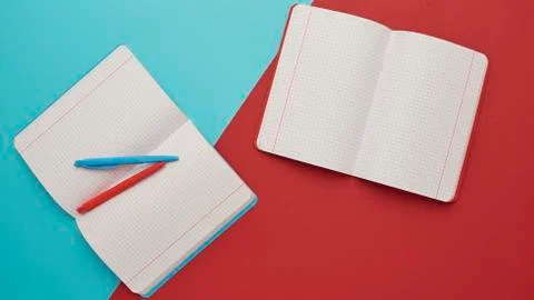 Notebook on a blue and red background Stock Photos