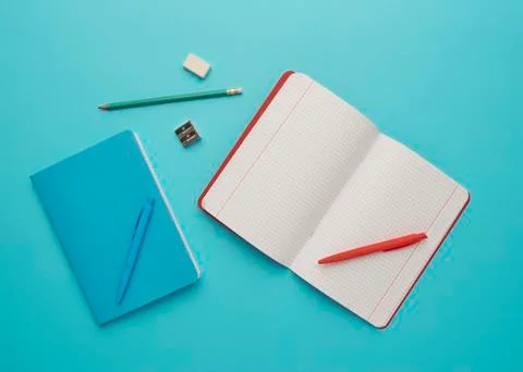 Notebook on a blue background Stock Photos