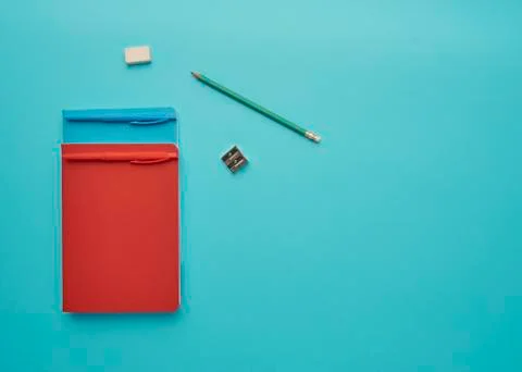 Notebook on a blue background Stock Photos