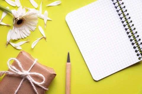 Notebook with broken  flower and gift Stock Photos