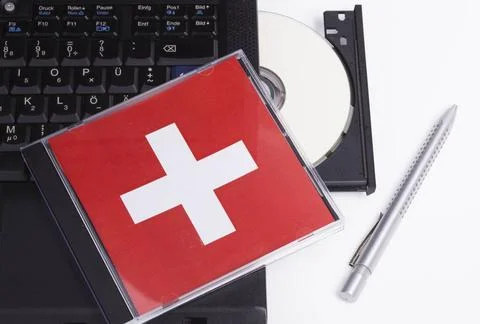  Notebook-CD-Schweiz Image shows a CD box and a notebook Copyright: xZoona... Stock Photos