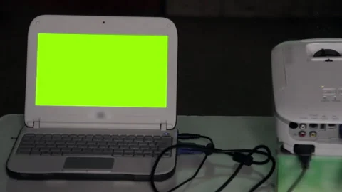 Notebook Computer Connected To Digital Projector With Chroma Key Background Stock Footage 344415574