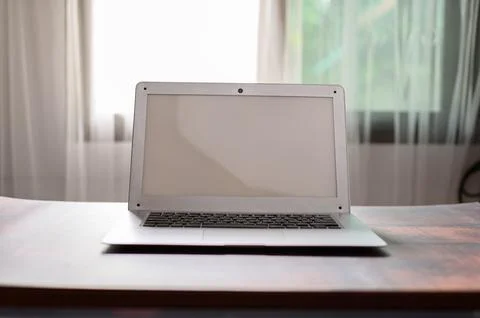 Notebook computer at the desk Stock Photos