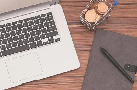 Notebook computers and books are on the desk. Stock Photos