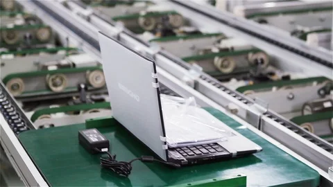Notebook Computers at the Conveyor Belt of an Electronics Factory. Fast Motion. Video stock 86622870