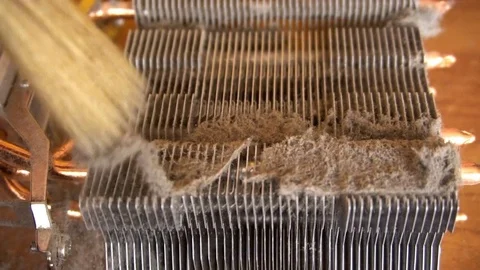 Notebook cooling system cleaning with a brush during service maintenance Stock Footage 77171231