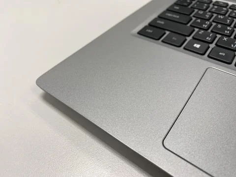 Notebook corner silver color save mode Stock Photos