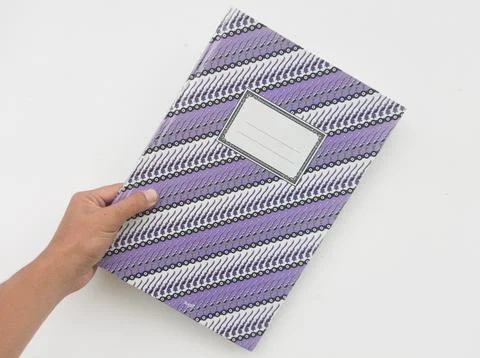 Notebook cover purple pattern holding Stock Photos