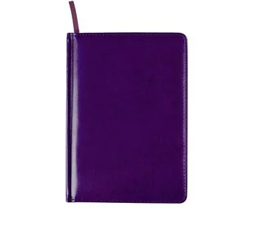 Notebook dark lilac on a white background is insulated. Stock Photos