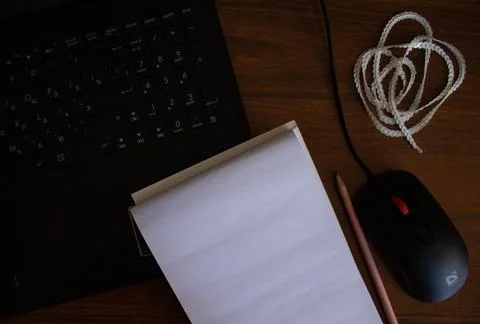 Notebook on the desktop Stock Photos