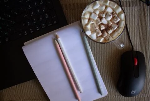 Notebook on the desktop Stock Photos