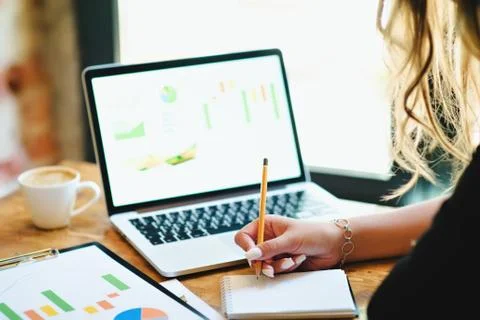 Notebook diagram of the hand table table Stock Photos