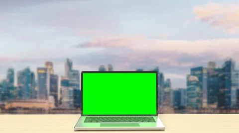 The notebook display green screen on rooftop building  for present concept 3d Fotos de archivo