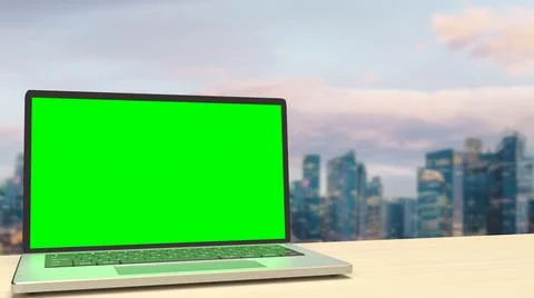 The notebook display green screen on rooftop building  for present concept 3d Fotos de archivo