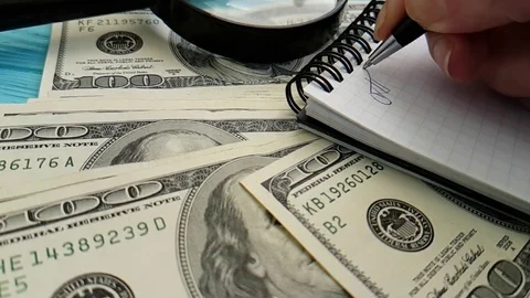 Notebook dollars, hand writes, slow-motion office Stock Footage 88140745