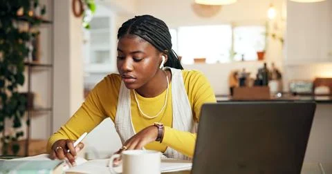 Notebook, elearning and black woman in home with earphones for online cours.. Stock Photos