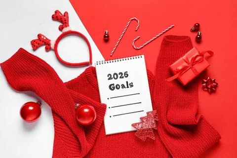 Notebook with empty to do list for 2026 year, sweater, gift and Christmas dec Stock Photos