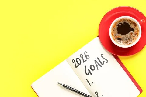 Notebook with empty to do list, eyeglasses and cup of coffee on yellow backgr Stock Photos