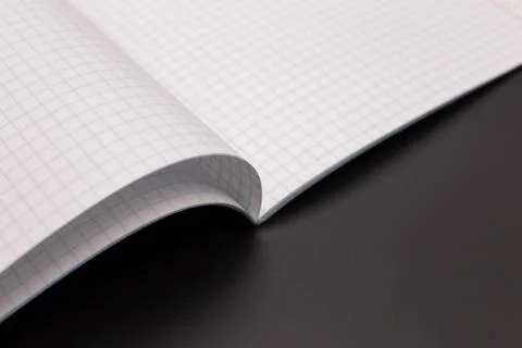 Notebook, exercise book, copybook on black background Stock Photos