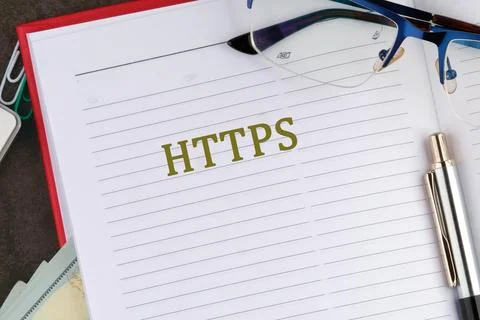 A notebook features the term HTTPS prominently written in bold, accompanied b Foto stock