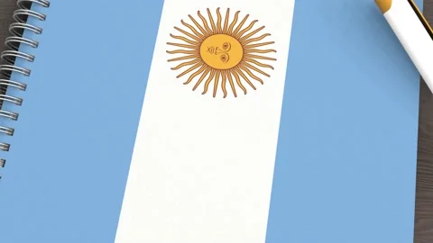 A notebook with the flag of Argentina and a lying pen Stock Footage 167827933