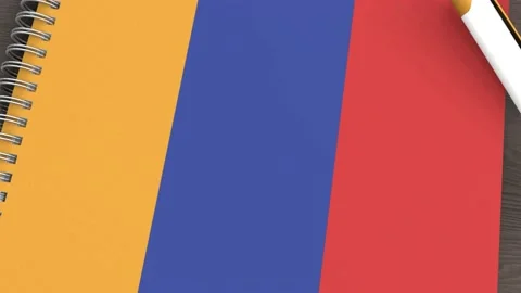 A notebook with the flag of Armenia and a lying pen Stock Footage 167827934