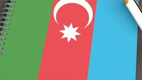 A notebook with the flag of Azerbaijan and a lying pen Stock-Footage 167827943