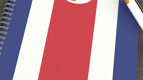 A notebook with the flag of Costa Rica and a lying pen Stock Footage 167828015