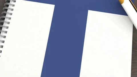 A notebook with the flag of Finland and a lying pen Stock Footage 167828068