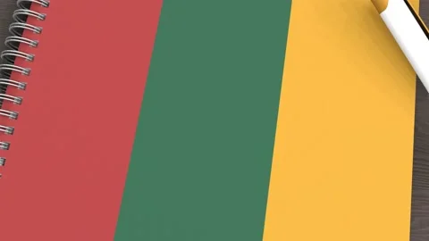 A notebook with the flag of Lithuania and a lying pen Stock Footage 167828174