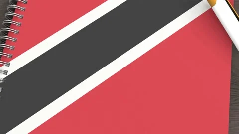 A notebook with the flag of Trinidad and Tobago and a lying pen Stock Footage 167828348