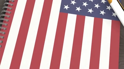 A notebook with the flag of USA and a lying pen Stock-Footage 167828371