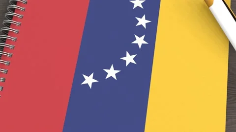 A notebook with the flag of Venezuela and a lying pen Video stock 167828379