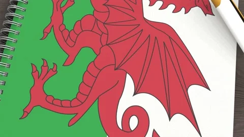 A notebook with the flag of Wales and a lying pen Video stock 167828381