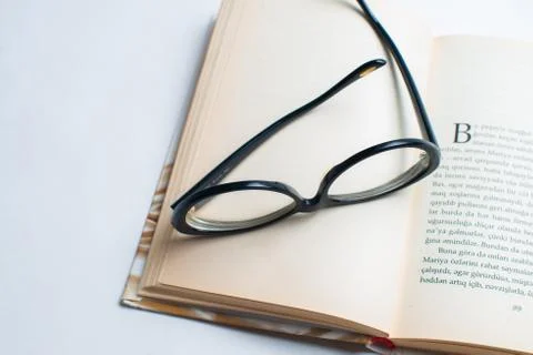 Notebook with glasses and pen, Book with glasses, Blue notebook with glasses, Stock Photos