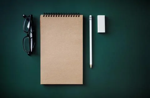 Notebook, glasses, pencil, eraser Foto stock