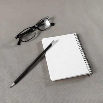 Notebook, glasses, pencil Foto stock