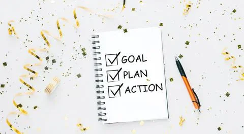 Notebook with goal plan and action list on festive background Stock Photos