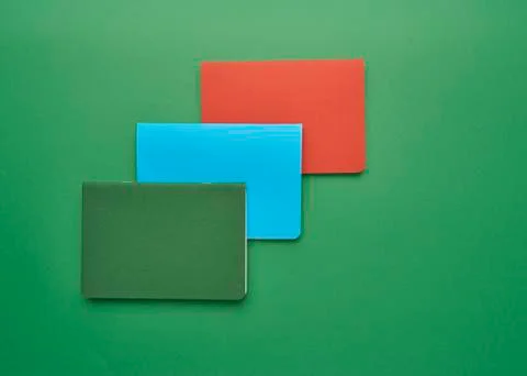 Notebook on a green background Stock Photos