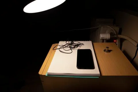 Notebook, headphone and notebook Concept on the desk. Closeup. Stock Photos