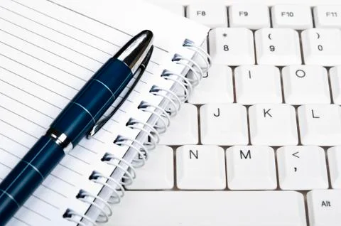 Notebook on keyboard Stock Photos