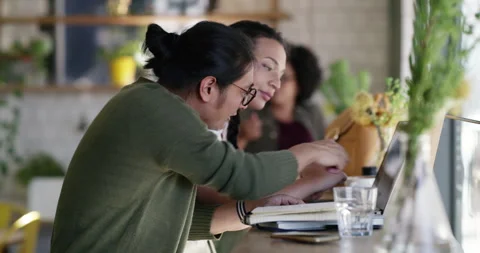 Notebook, laptop and team with people in cafe for remote work, restaurant Stock Footage 345810062