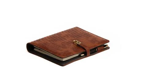Notebook in a leather case on a white background. Stock-Fotos