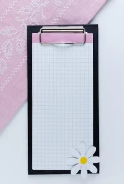 Notebook lies on a white background. Stock Photos