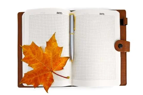 Notebook with a maple leaf Stock Photos