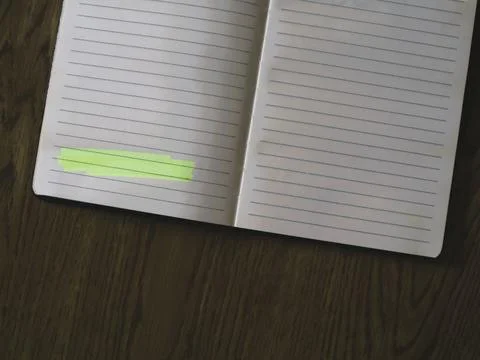 A notebook marked with colorful sticky notes for productive daily lifestyle Stock Photos