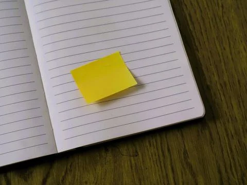 A notebook marked with colorful sticky notes for productive daily lifestyle Stock Photos