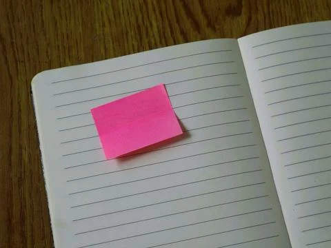 A notebook marked with colorful sticky notes for productive daily lifestyle Stock Photos