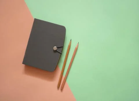 Notebook on minimal color background Stock Photos