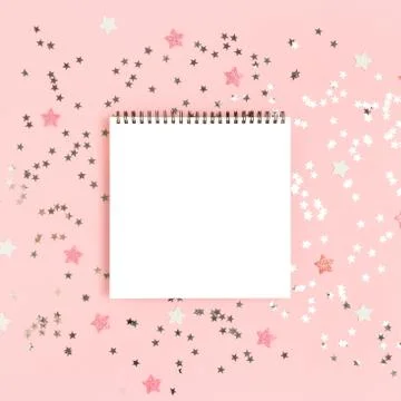 Notebook mockup on a pink pastel background Stock Photos